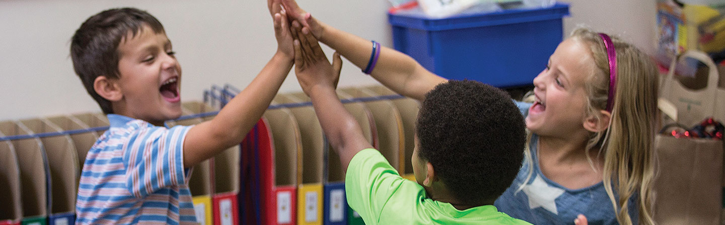 Students high fiving